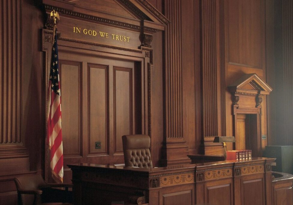 A courtroom with the american flag on it.